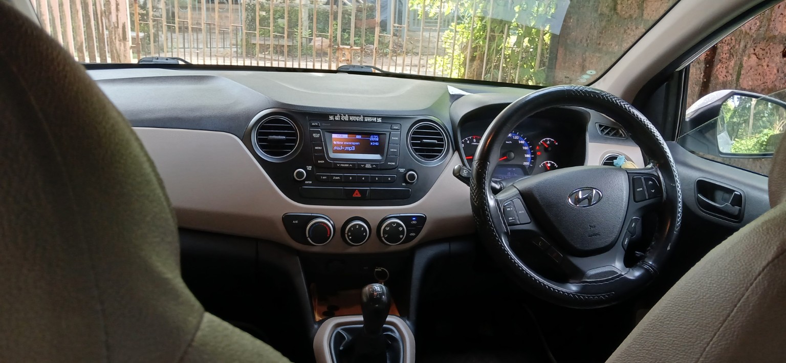 Car dashboard and interior in Malvan rental car