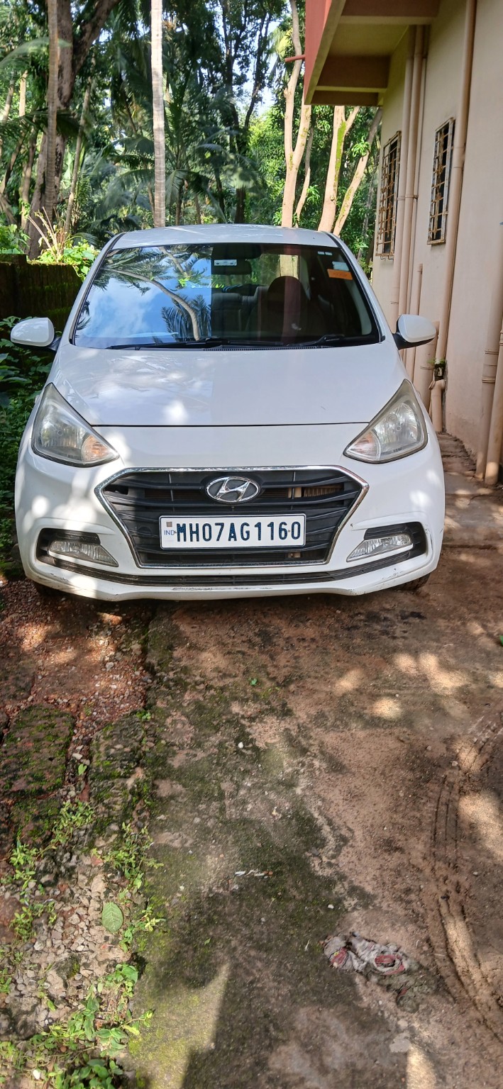 White car available for Malvan car rental